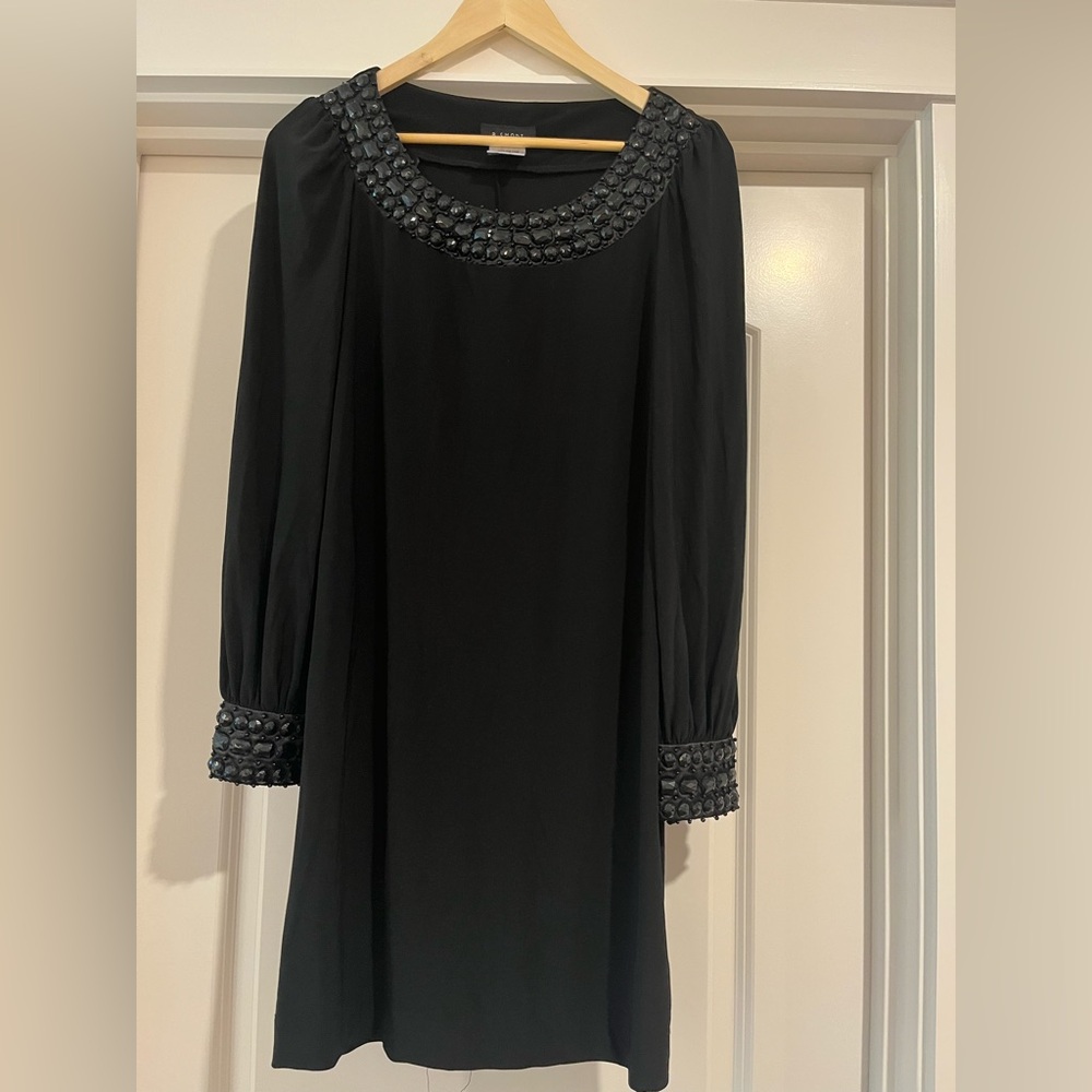 B. Smart Black Dress with Embellished Neckline and Cuffs
